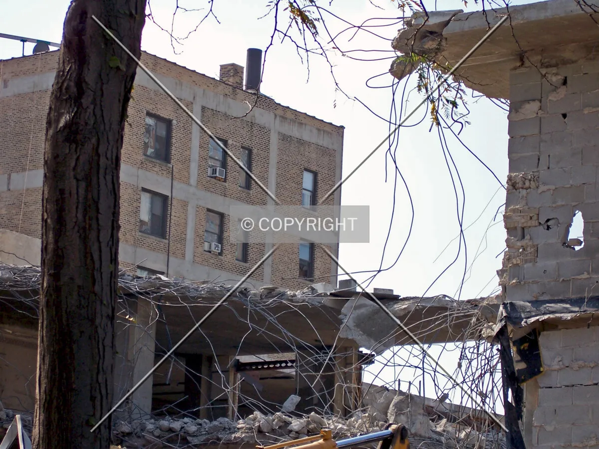Looking southwest from Foster Avenue at the demolition of the low-rise addition