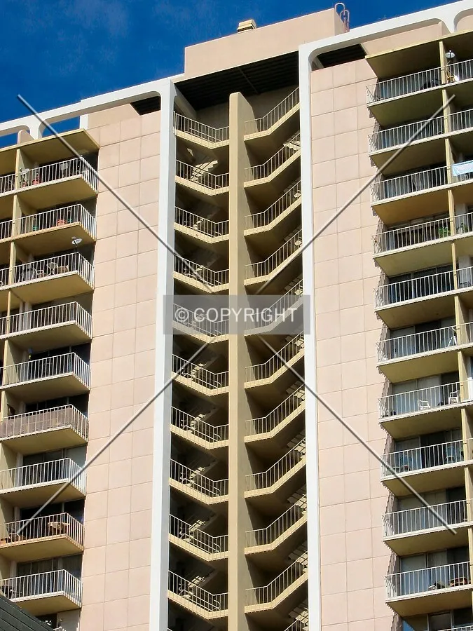 External stairwells punctuate the south facade