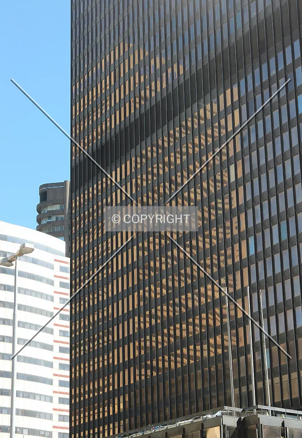 Reflection of the Atterbury House in the south facade