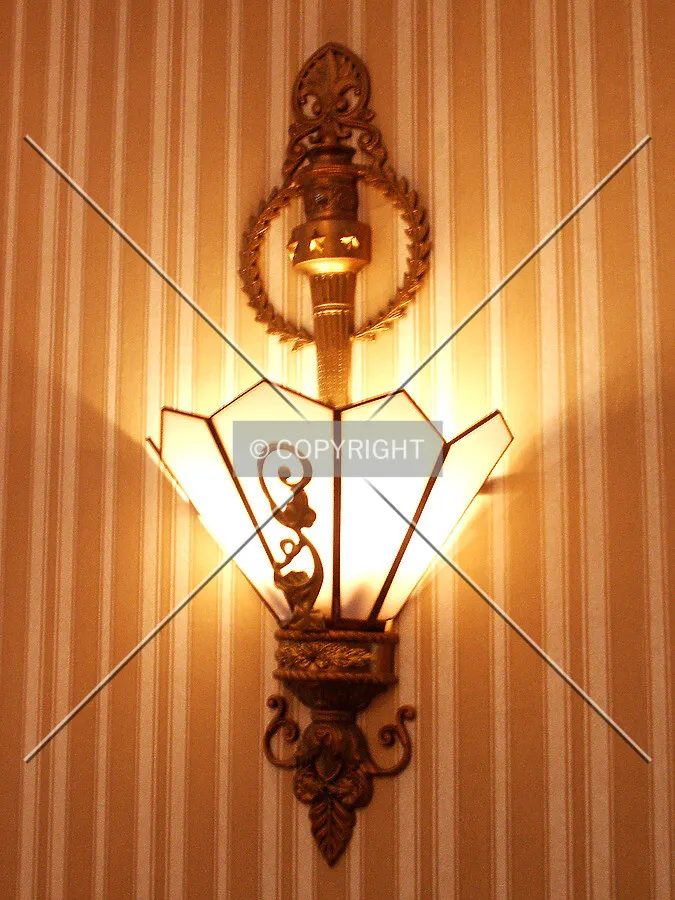Wall lamp near the south stairway in the lobby