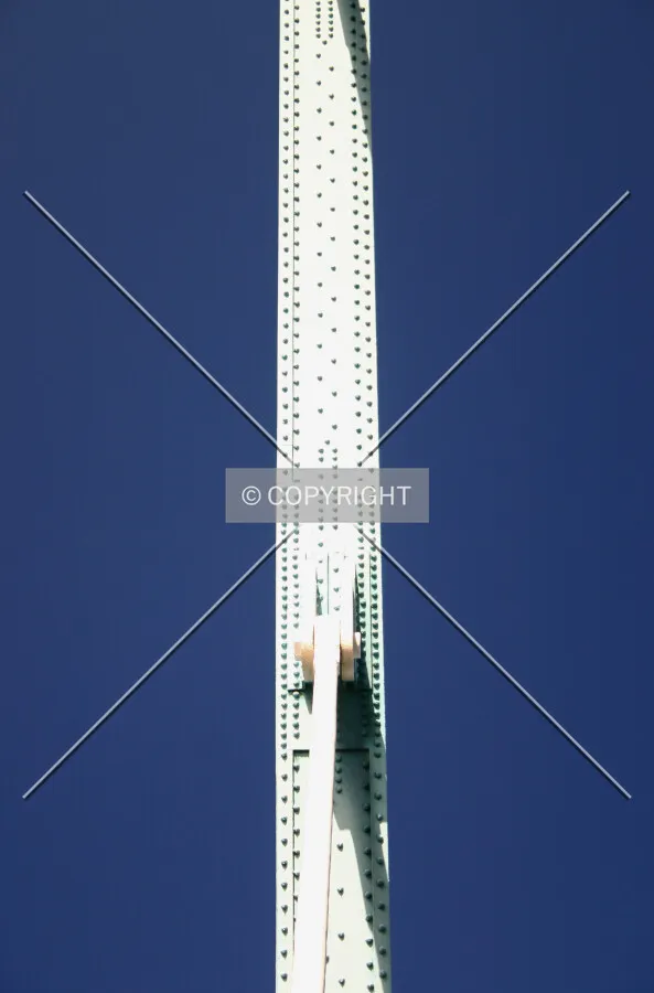 Looking up vertically at suspension ironwork