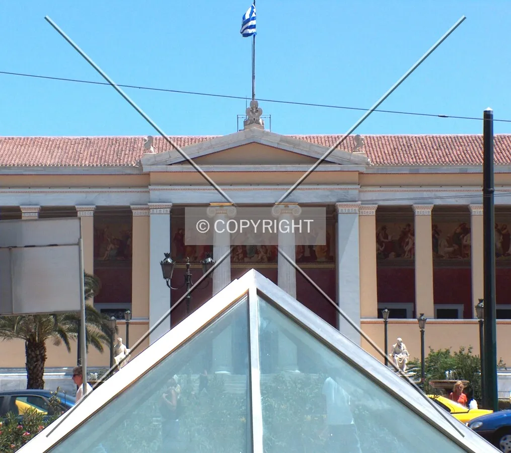 View of Athens University with the glass pyramid of the Panepistimio Metro Station