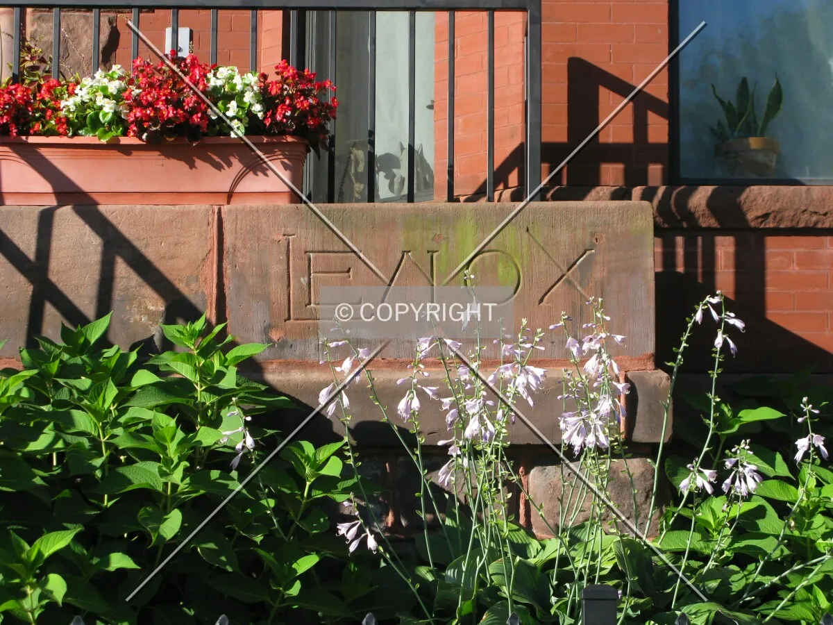 Building name next to a stoop
