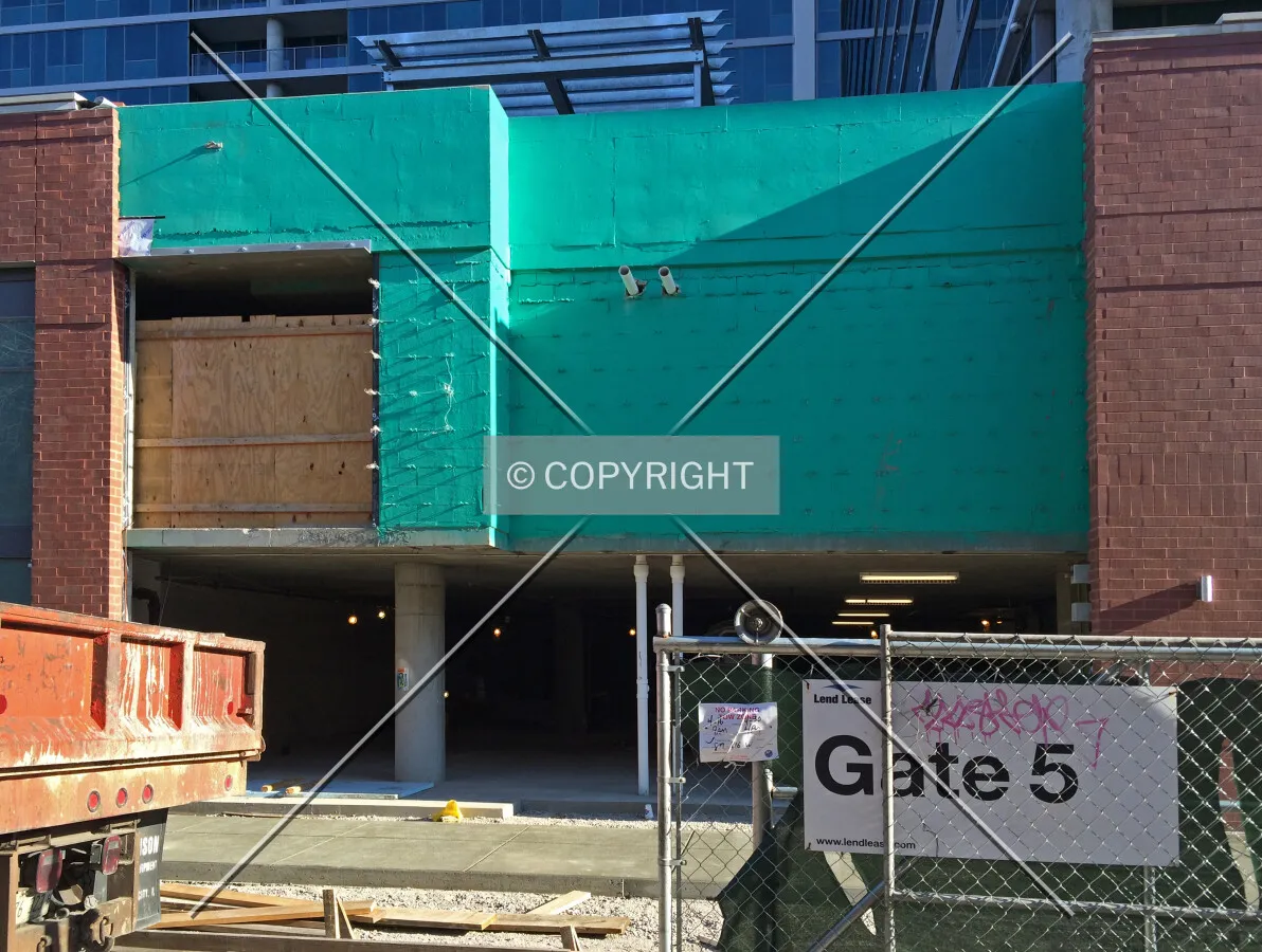 Unfinished portion of the south facade along Bradley Place; April 23, 2014.