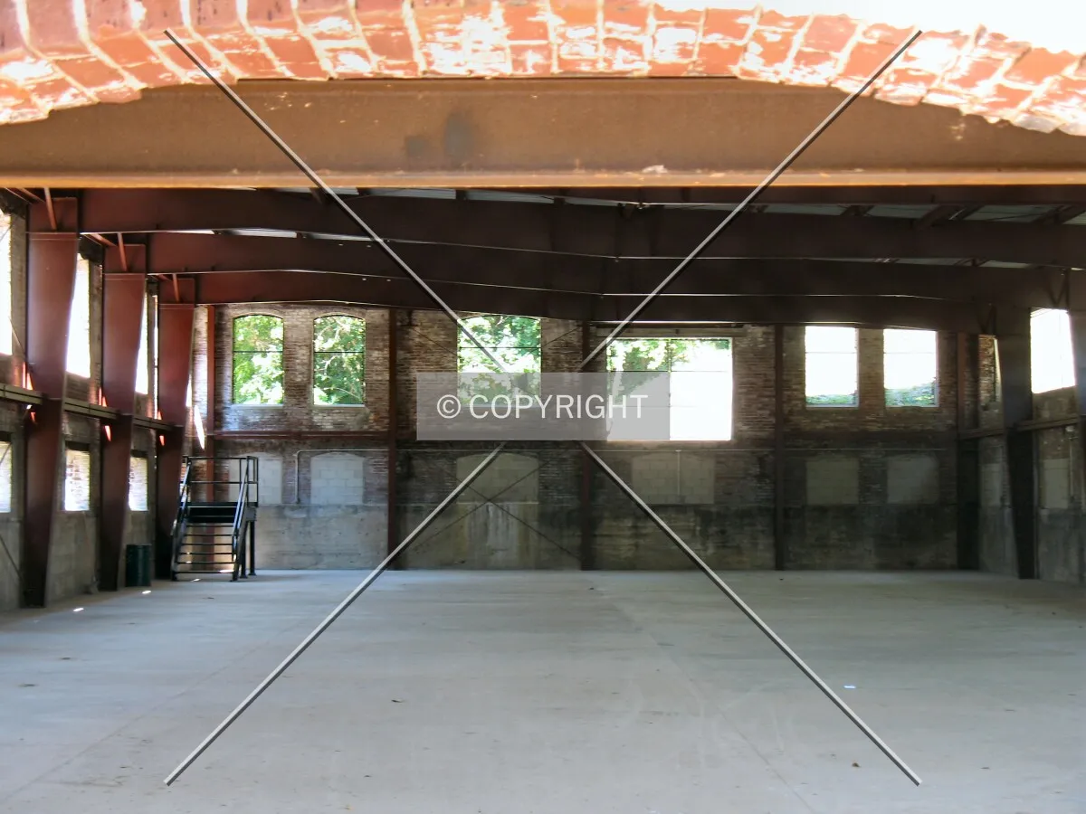 Inside the pavilion, with a new floor, new structural support for the brick walls, and new roof