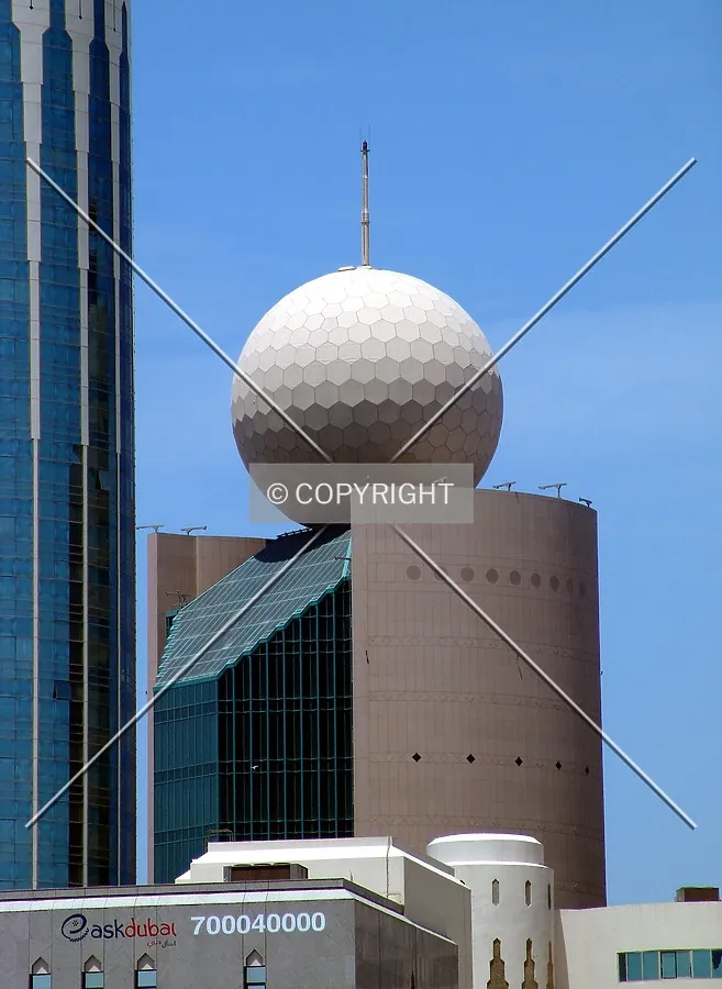 The upper floors and golfball at the top