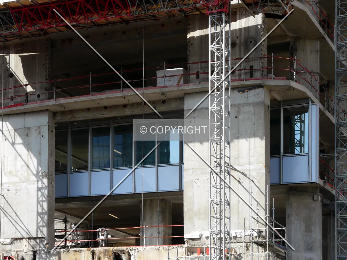 First glass panels installed on the base