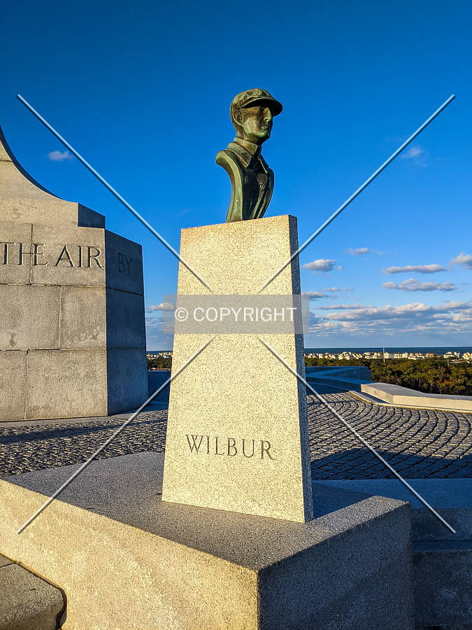Bust of Wilbur Wright at the base