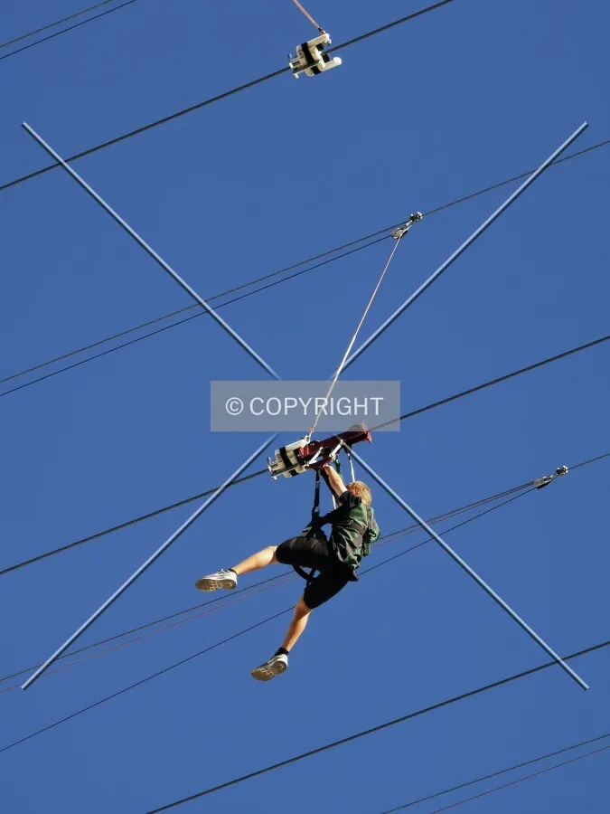 Boy using a zipline