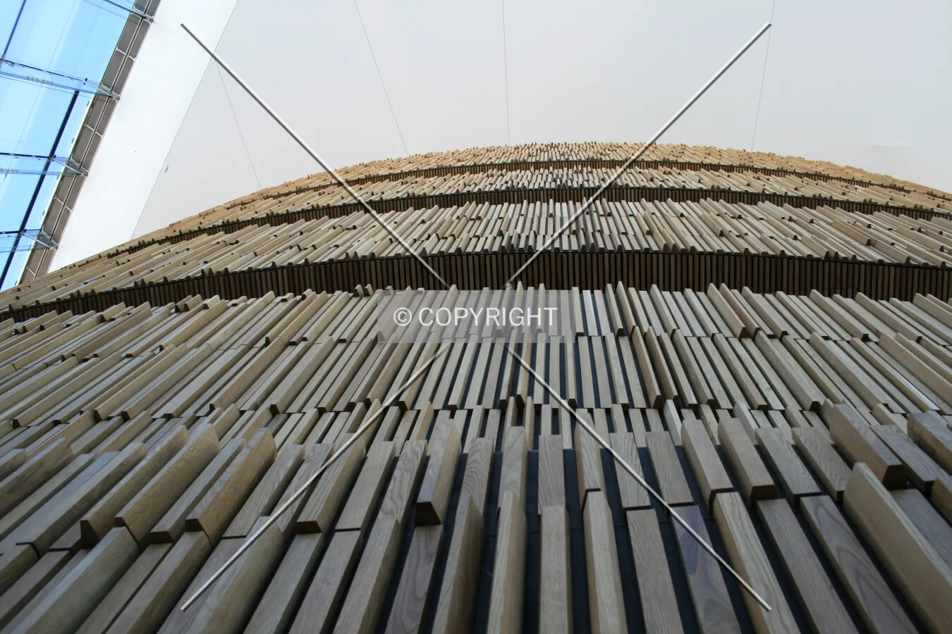Looking up the main wooden wall in the lobby