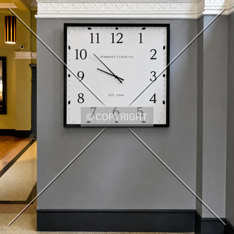 Clock on the lobby wall, Monday, August 10, 2026