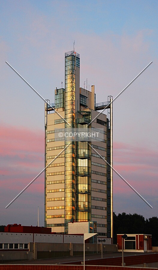 Sunset reflections from the facade