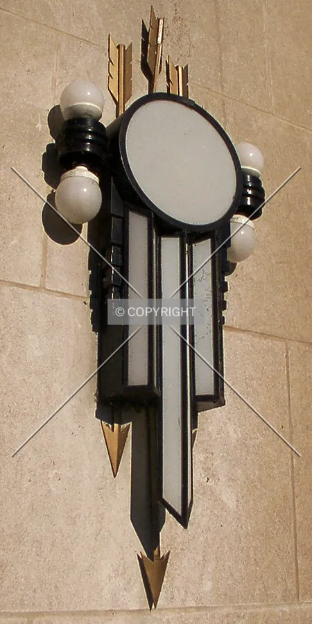 Light fixture with arrow ornaments