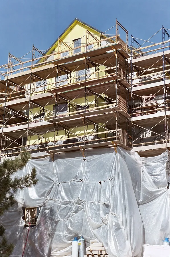The southeast wall covered in scaffolding