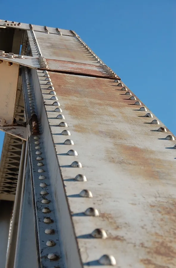 Beam and rivets