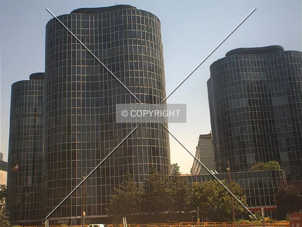 Rising in front of other buildings in the project