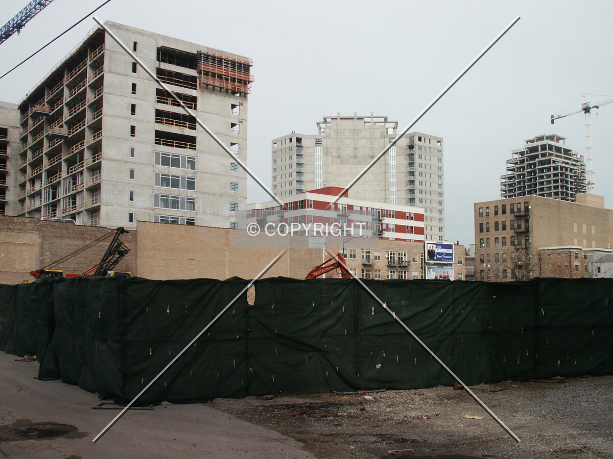 Looking northeast from the alley, with three other high-rises under construction in the background
