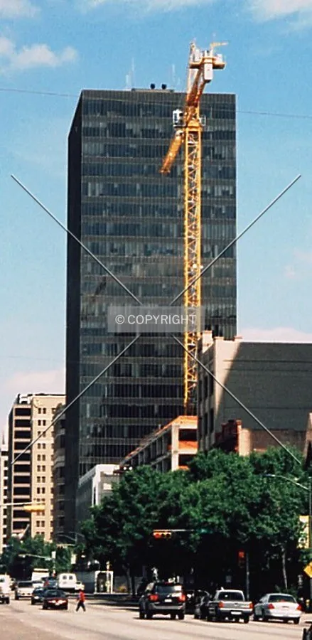 View to the north along Congress Avenue; Congress at Fourth tower crane in view
