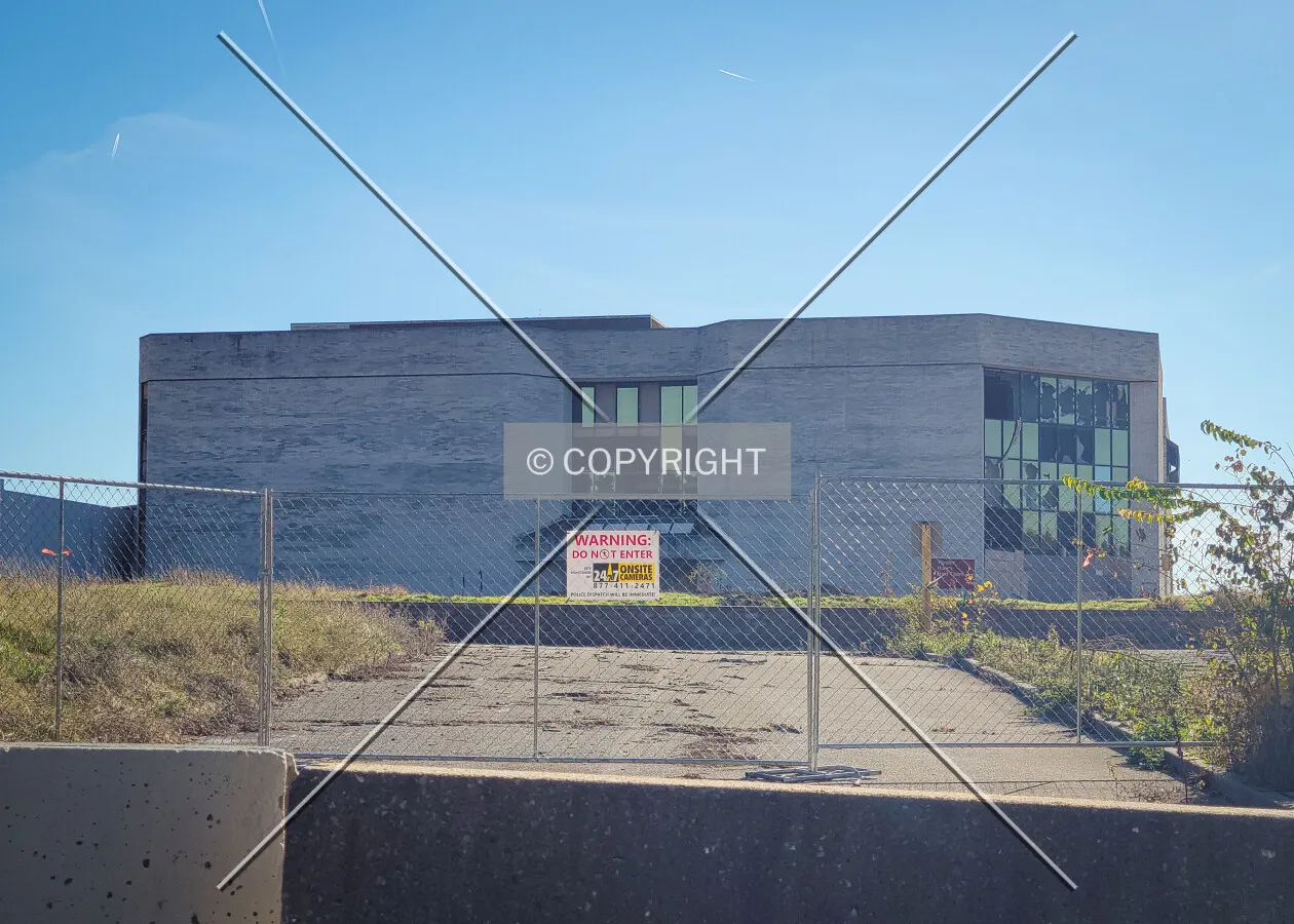 The former Dillard's department store from the west during demolition; November 3, 2023