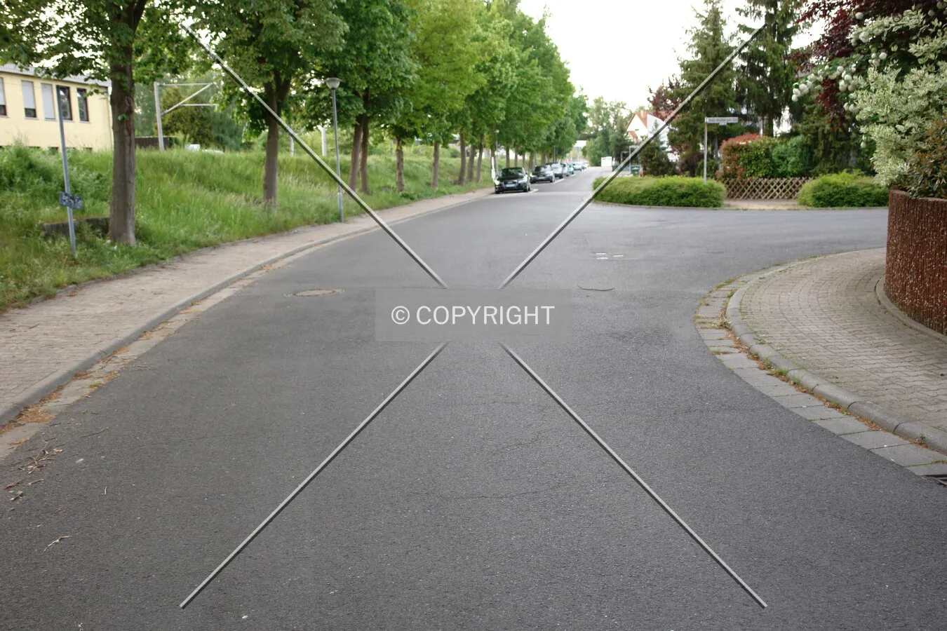 A calm residential area and an empty street