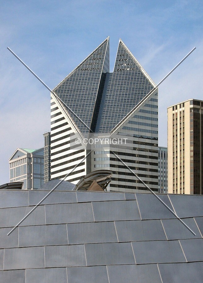 Top floors rising above the BP Bridge in Millennium Park