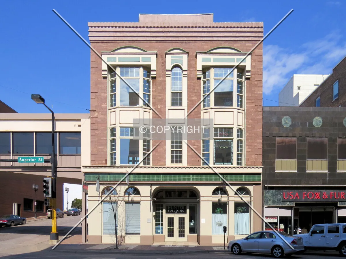 Full front elevation across Superior Street