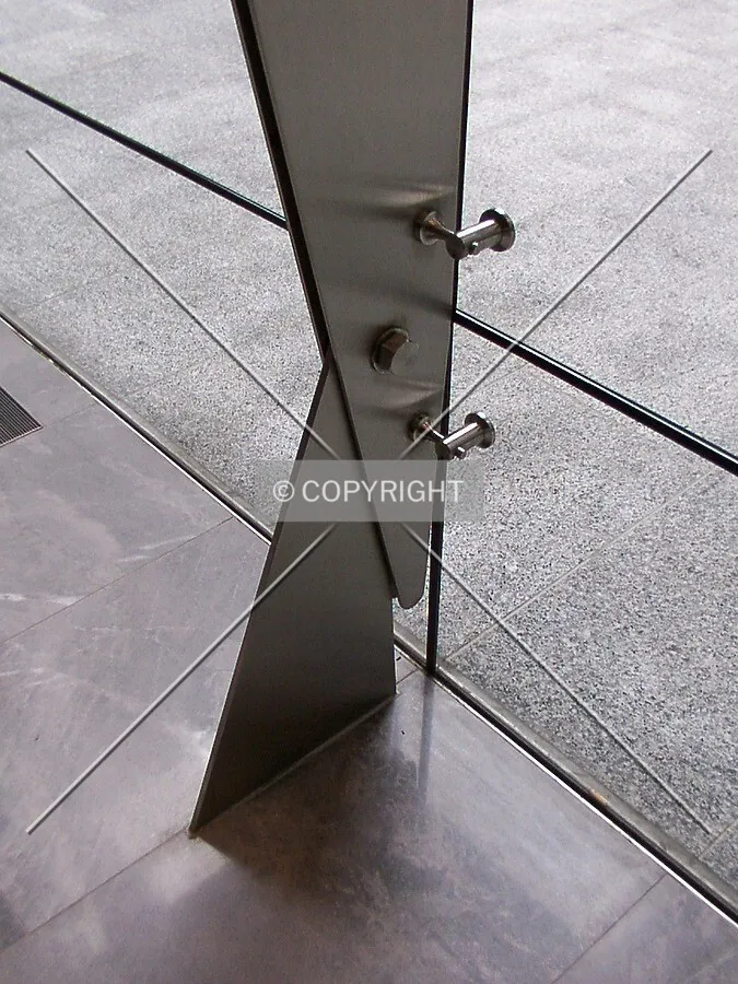 Metal fin supporting the lobby's glass wall