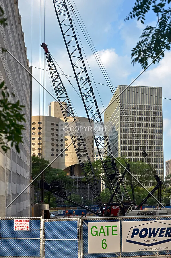 Looking north across the site from Ontario Street. The old Rehabilitation Institute Center and neighboring old Prentice Hospital are seen in the background. September 6, 2013.