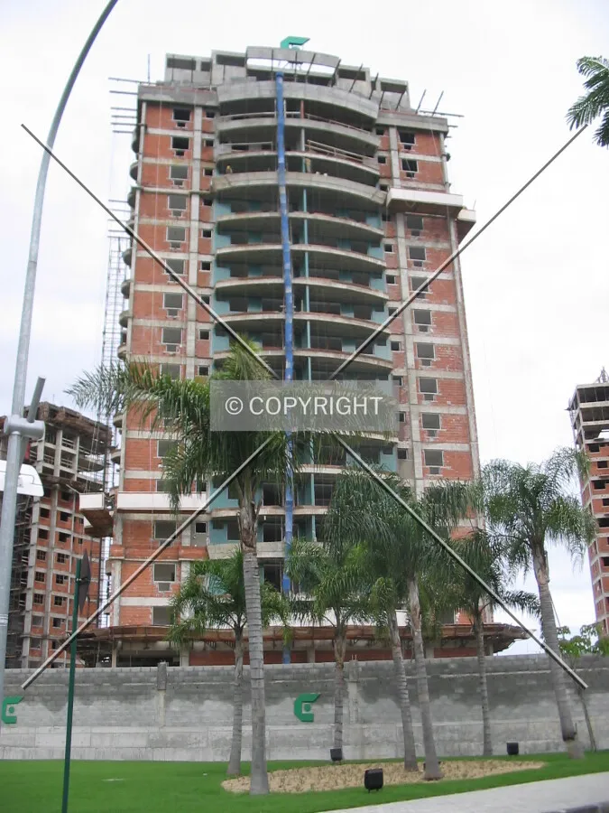 Starting placing the ceramic tiles in the facade
