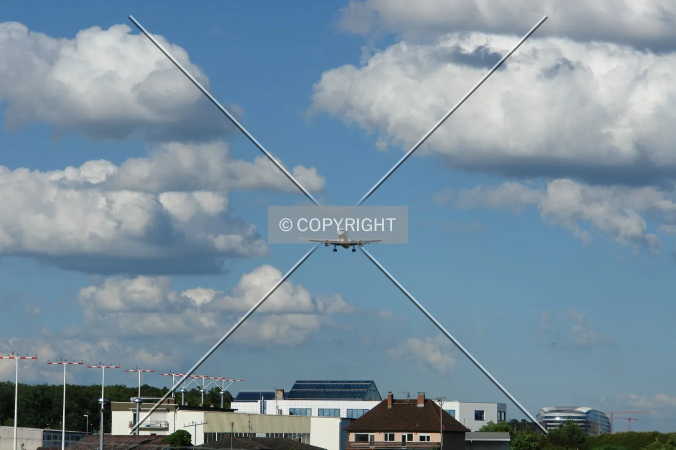 A plane above buildings of Kelsterbach