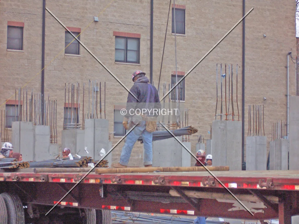 Unloading rebar from a flatbed truck