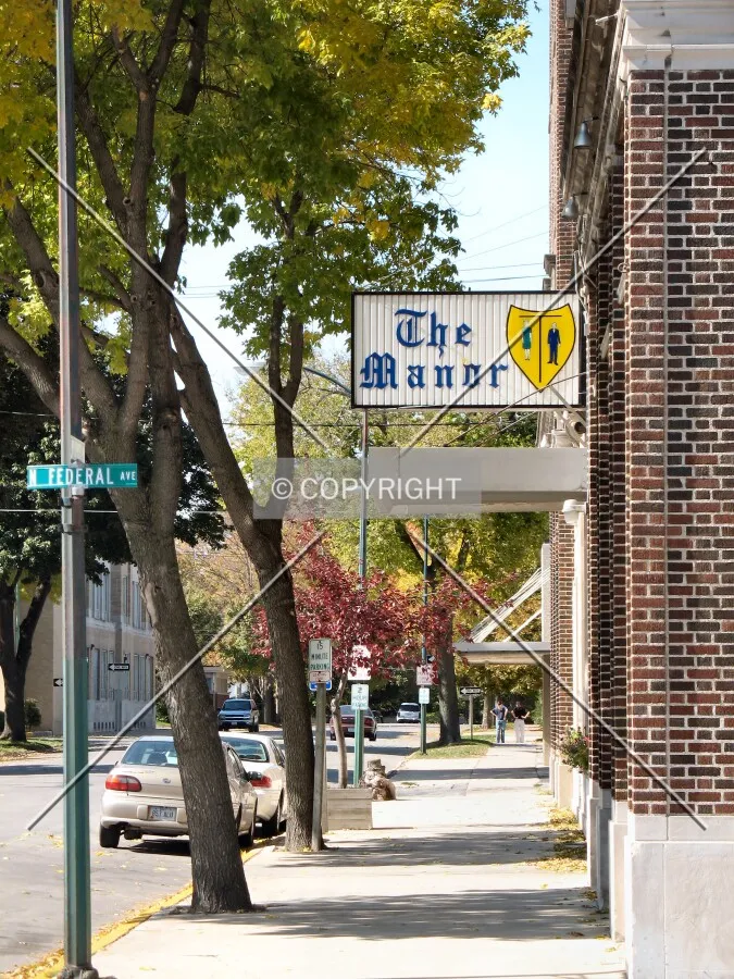 Building sign over the 3rd Street sidewalk