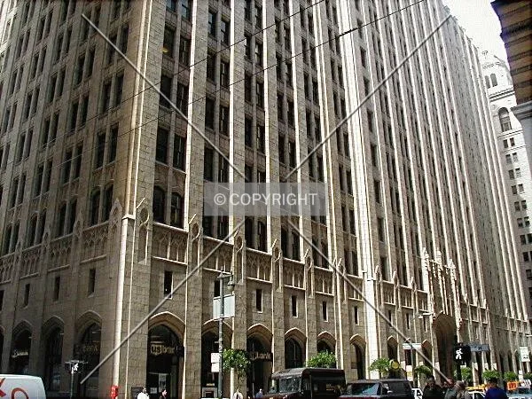 The wide base occupies an entire city block
