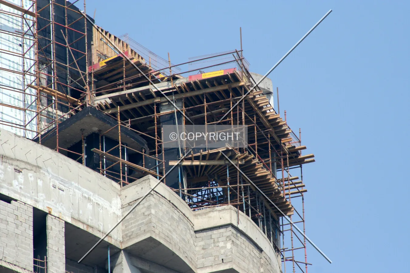 Looking up at scaffolding on the top