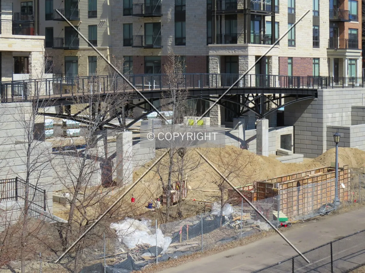 Pedestrian bridge and Midtown Greenway entrance