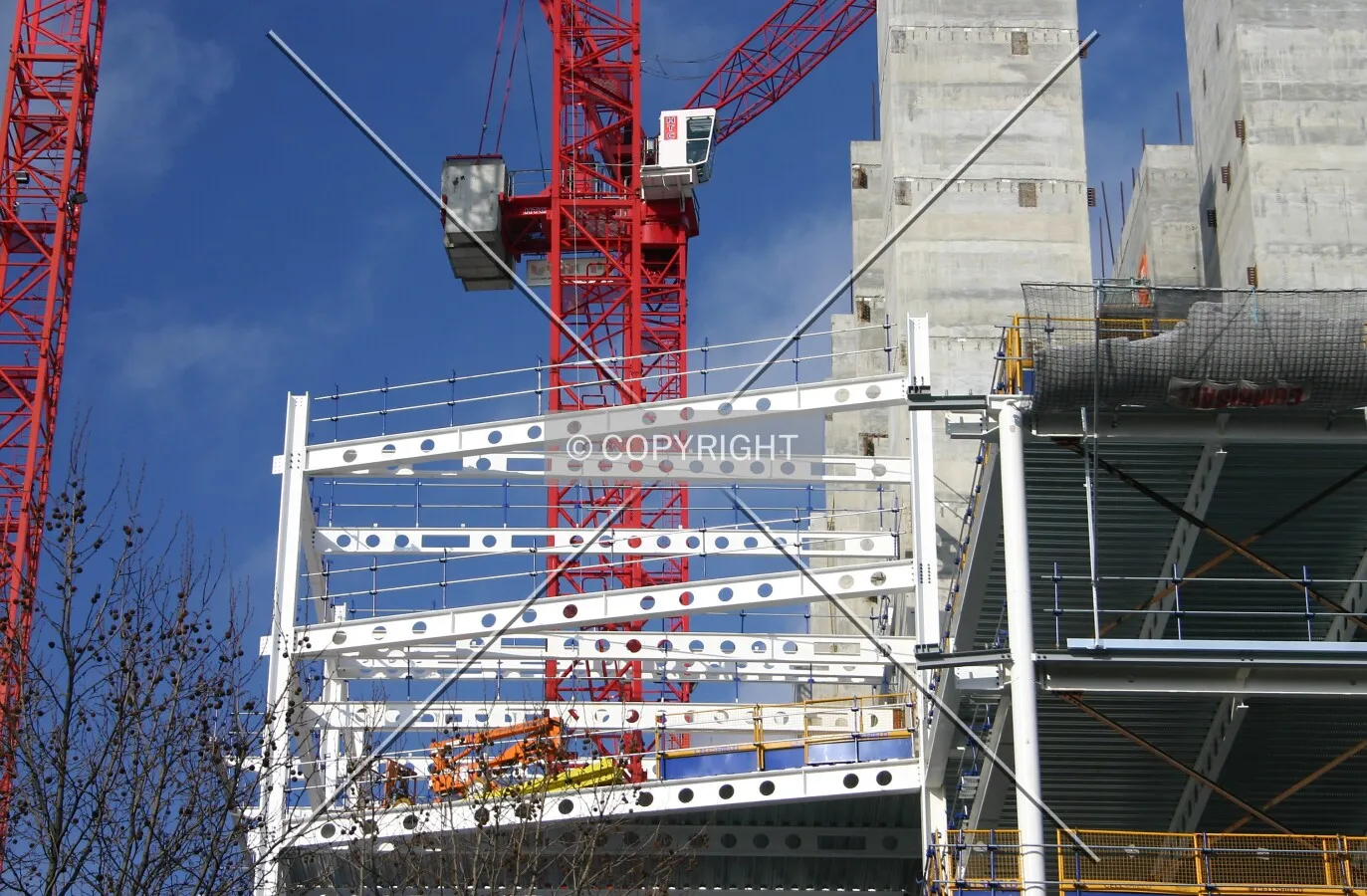Looking up at steelwork and cores from Shaftesbury Avenue