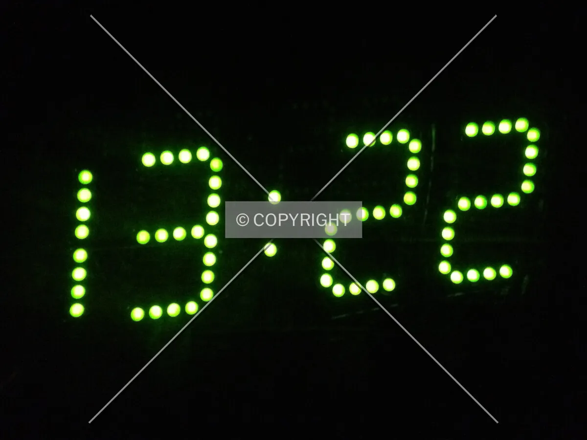 A digital clock showing the current time. Right now it is 13:22