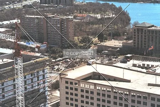 Parking lot where the tower will rise from the 21st floor of 301 Congress