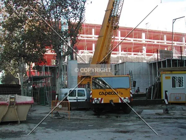 View of some mobile cranes placing a new crane