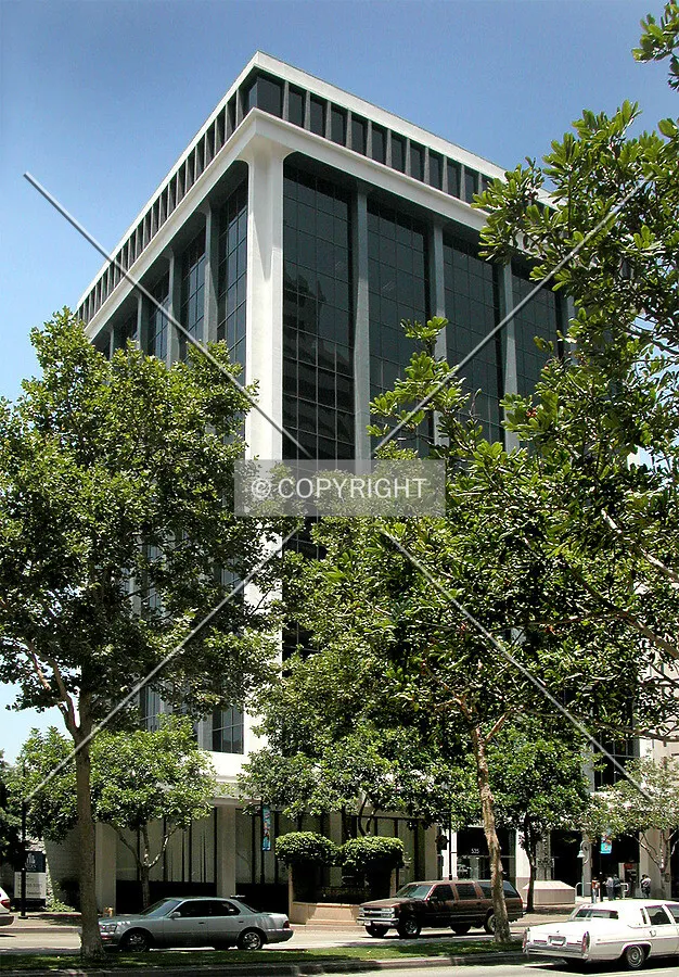 Front of the building along tree-lined Brand Boulevard