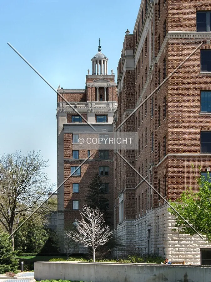 View to the east along the north side of the Francis Building, Tower section rising in the distance