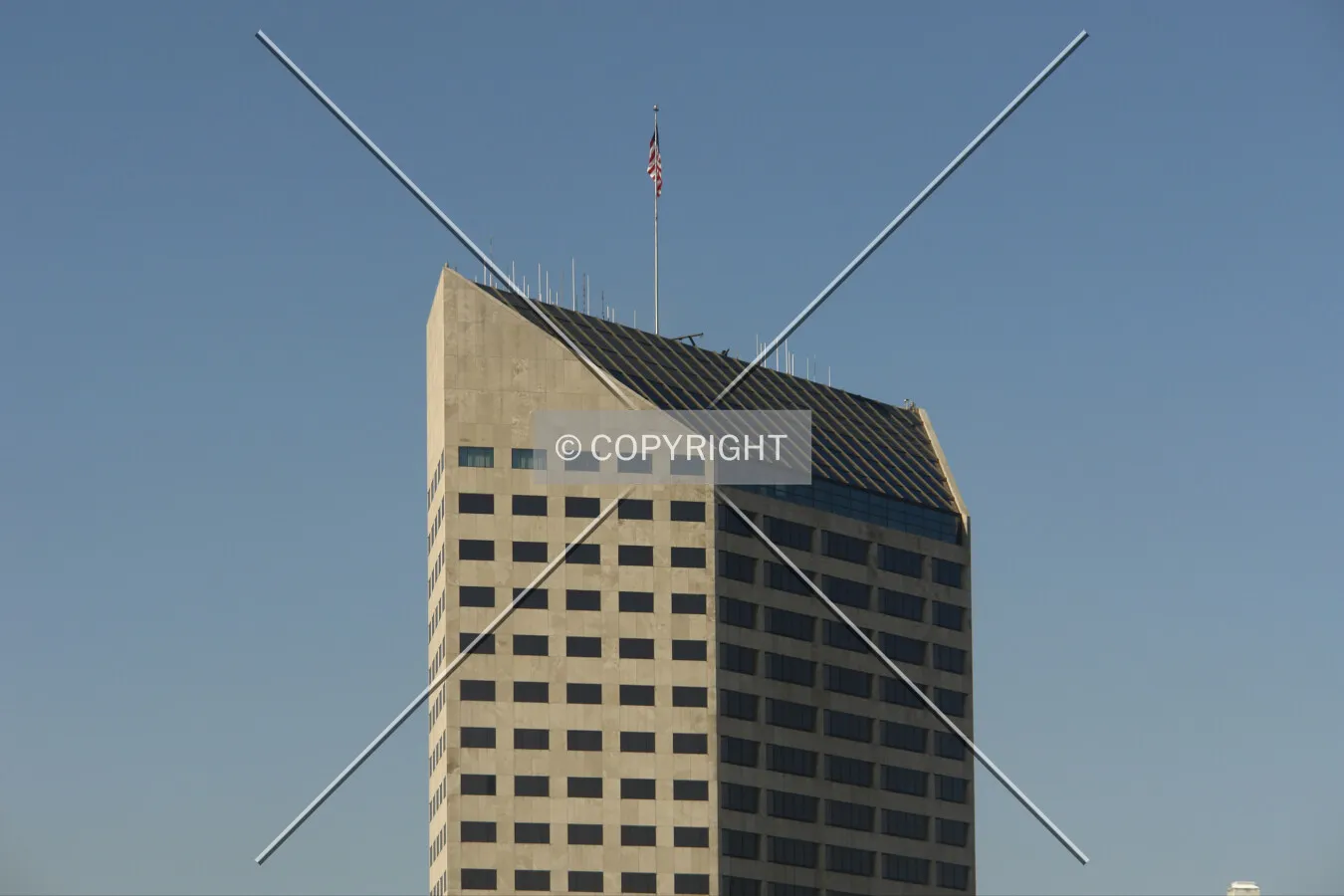 Top of the AmericaOne Tower including the flagpole and the U.S. flag