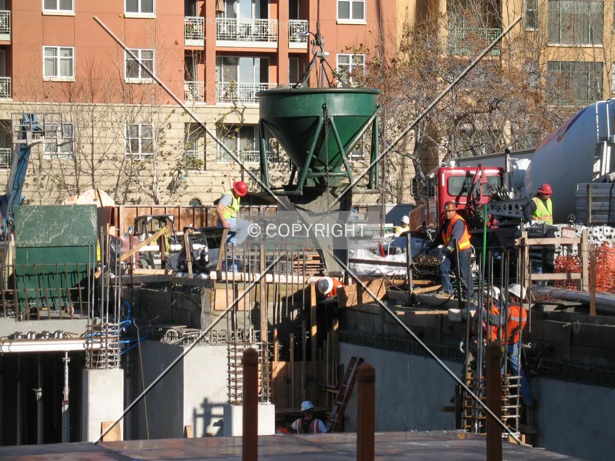Concrete bucket is moved into position for a new column pour