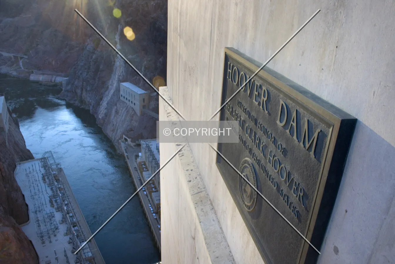 Plaque at the dam's roadway with the Colorado River below