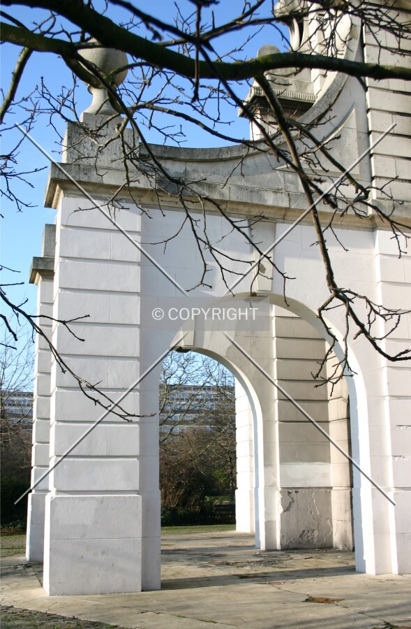 One of eight buttressed arches which surround the base of the tower