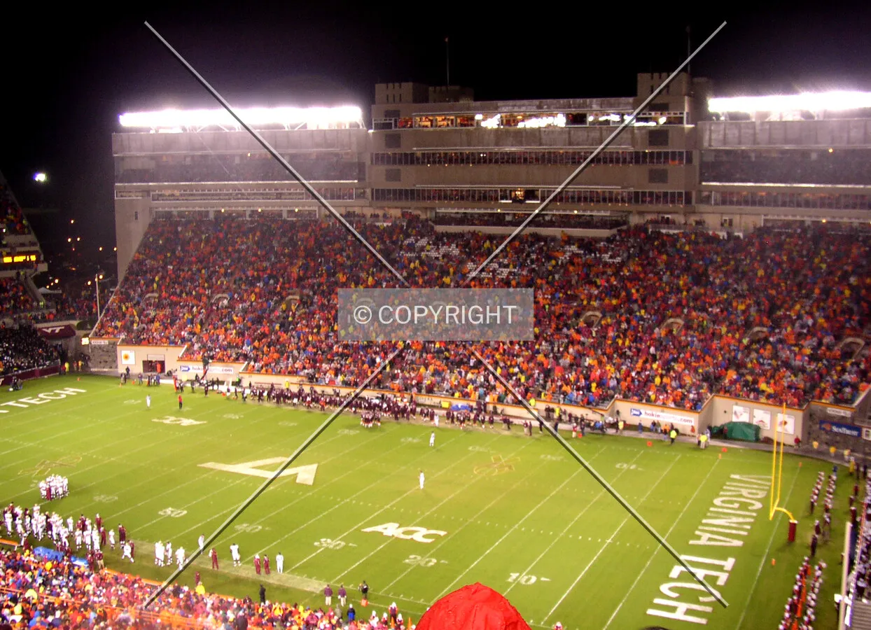Hokies taking the field for the second half on a rainy October night
