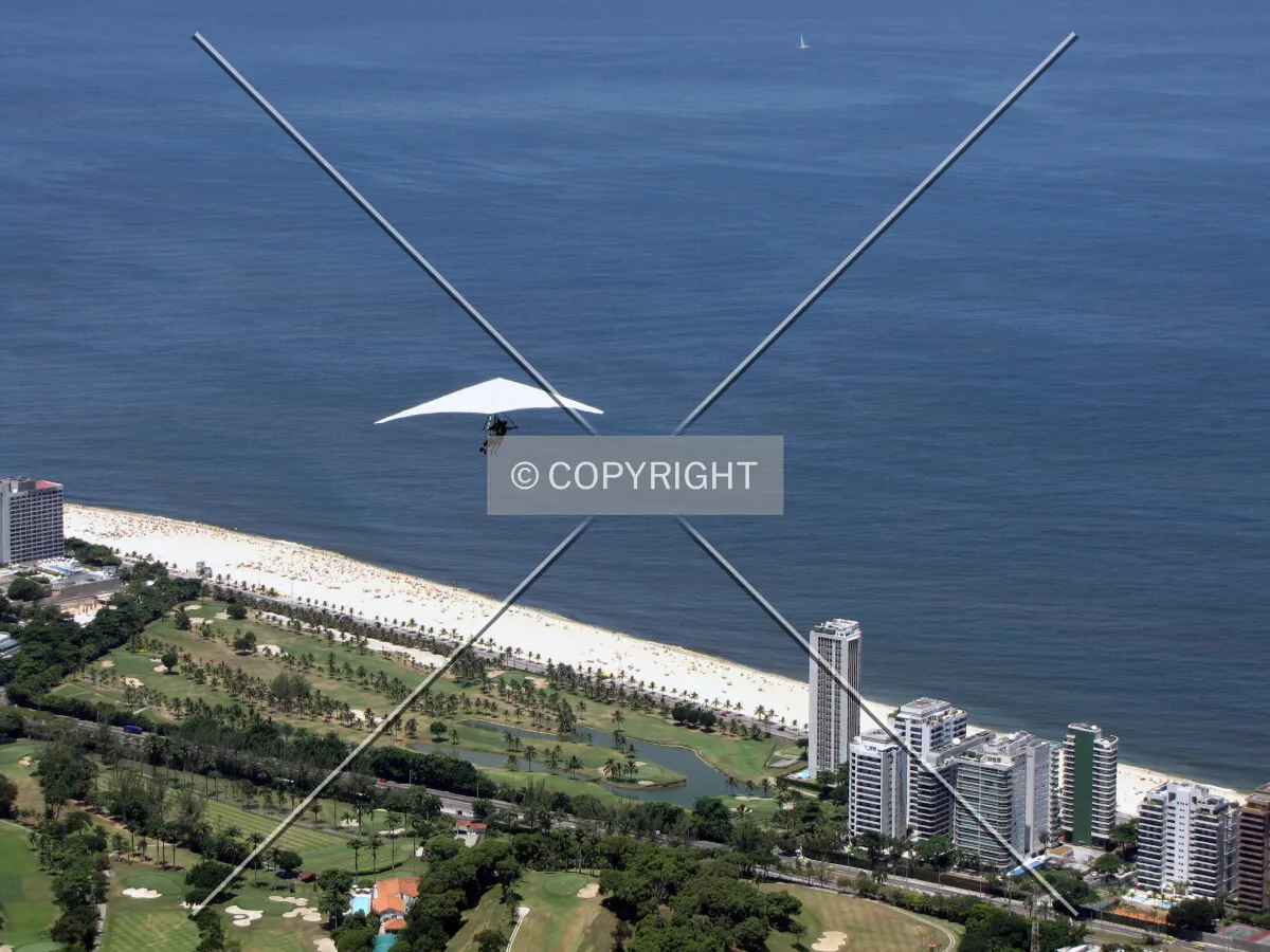 Hang-glider and São Conrado skyline