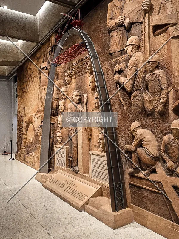 A minature Arch displayed in front of other national monument projects in the lower level, Sunday, October 4, 2026