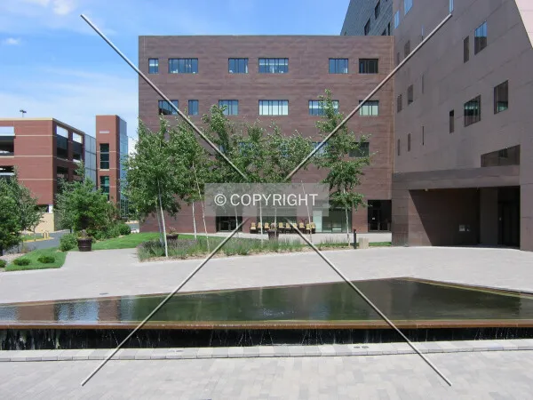 West wing and west entrance beyond water feature