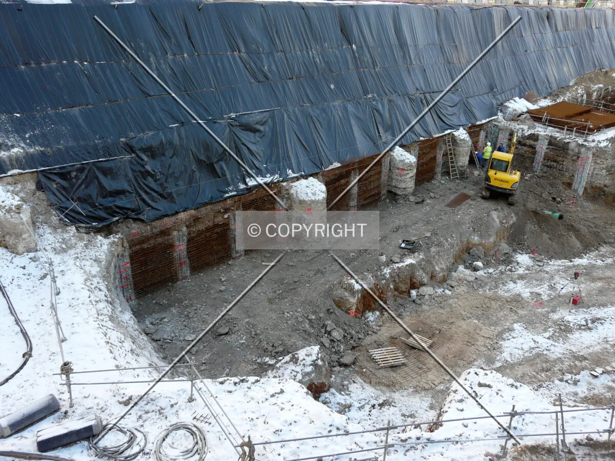 Retaining wall being built along Rue des Grands Moulins